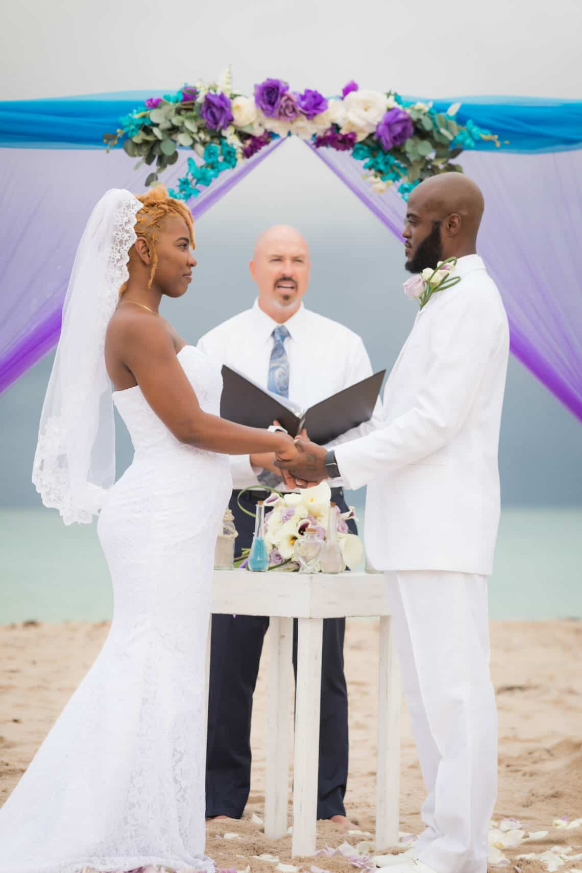 Wedding-bells-and-seashells-officiant-1140x1711 Jpg