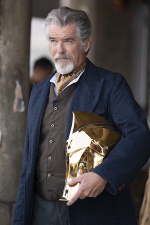 Pierce Brosnan wears his wedding ceremony ring as Dr. Destiny in 'Black Adam' - Neccessary Presence