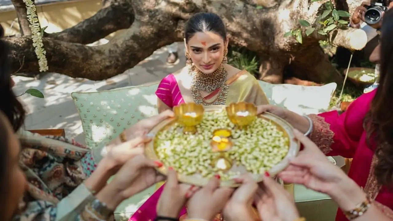 Athiya Shetty looks dreamy under a floral shower in THESE pics from her pre-wedding ceremony with KL Rahul